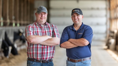 Alltech on-farm support representative with a customer